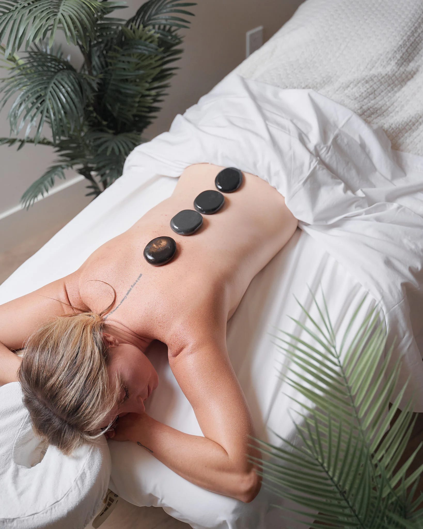 Hot stone massage at Leela Eco Spa.