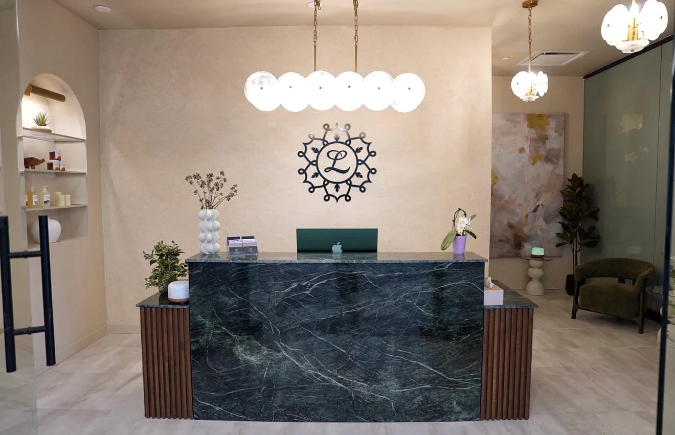 Interior of Leela Eco Spa at Bankers Hall — treatment space with calm lighting.